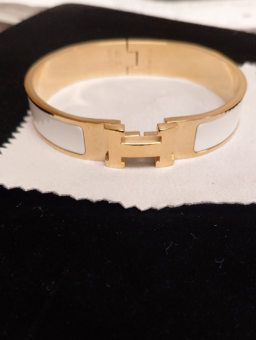 HERMES Gold and White Enamel Hinge Bangle Bracelet with Signature H Accent